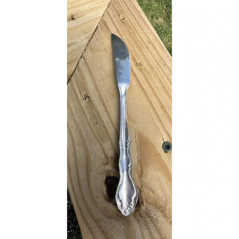Unmarked Butter Knife. Made In Japan. Flower And Swirls. 6.75